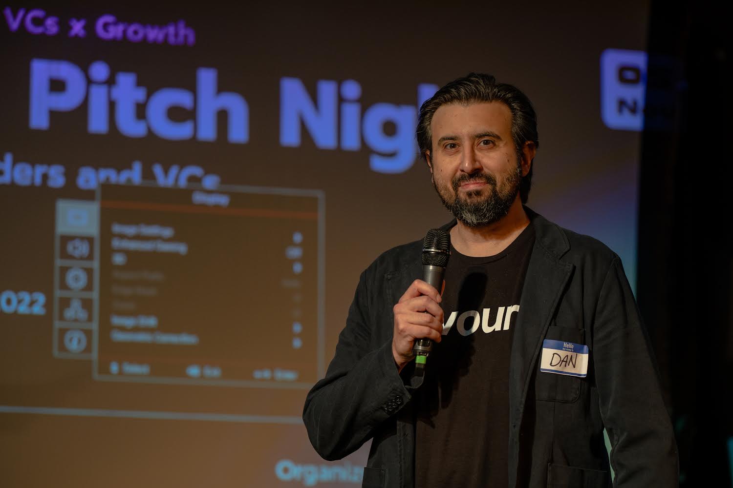 Dan McDermott on stage at VCs x Growth Pitch Night